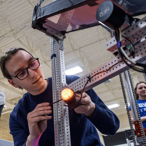 Dr. Abishek Balsamy-Kamaraj supervising students during Robotics.